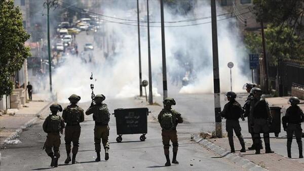 Suffocation injuries ,arrest of two children during clashes with enemy forces south of Nablus Suffocation injuries ,arrest of two children during clashes with enemy forces south of Nablus