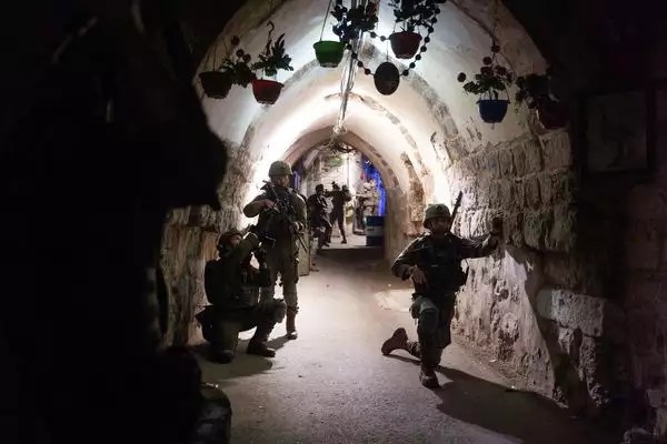 Zionist enemy military vehicles storm Old City of Nablus Zionist enemy military vehicles storm Old City of Nablus