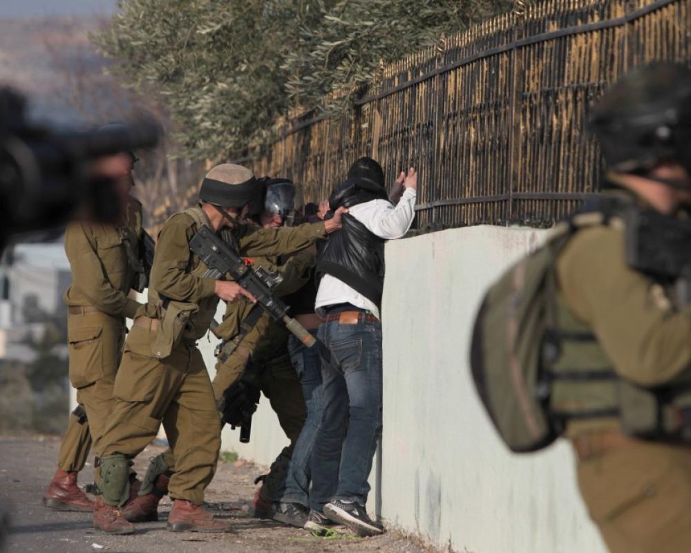 Zionist enemy forces assault freed Palestinian prisoner from Beit Fajjar