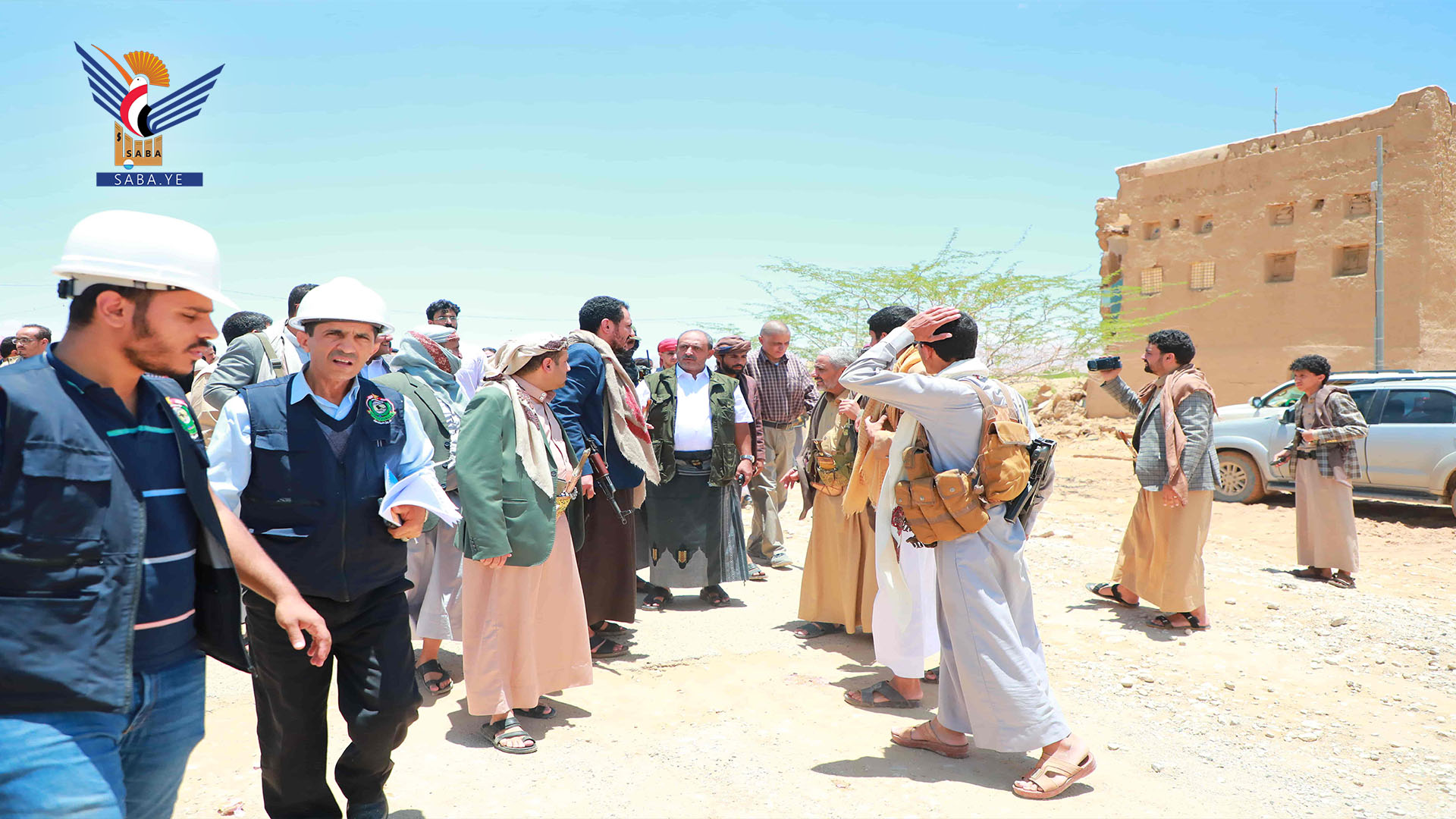 Al-Hamli, Haider et une délégation internationale inspectant les dégâts des inondations dans le gouvernorat d'Al-Jawf Al-Hamli, Haider et une délégation internationale inspectant les dégâts des inondations dans le gouvernorat d'Al-Jawf