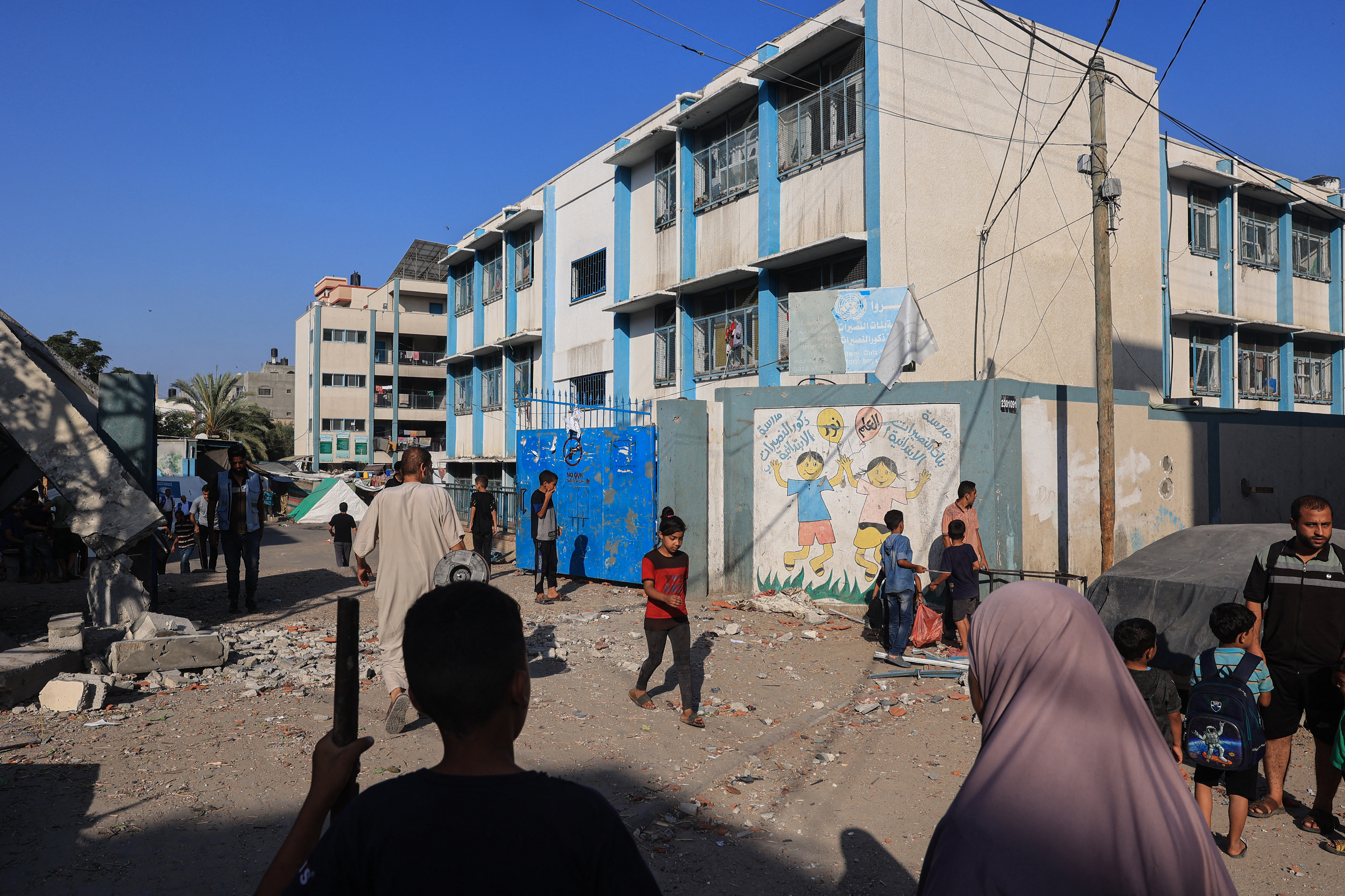 Four Palestinians martyred, others injured in enemy shelling of School sheltering displaced people in Gaza Four Palestinians martyred, others injured in enemy shelling of School sheltering displaced people in Gaza