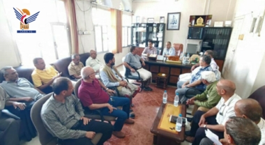 Inspecting work progress at tax office in province