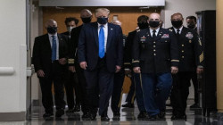 ترامب يظهر بكمامة للمرة الأولى خلال زيارة لمنشأة طبية عسكرية