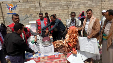 Distribution shelter materials to affected by torrential rains in Amran