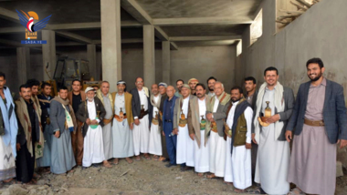 Inspecting work on government complex building project in Sana'a