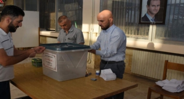 Syrians head to polling stations to cast their votes in legislative elections