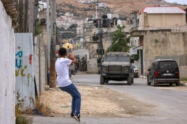 Palestinian resistance fighters confront enemy forces in Balata Camp