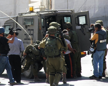 Zionist enemy forces arrest 26 Palestinians in various areas of West Bank