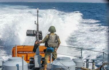 Zionist enemy boats fire shells at Gaza Sea beach