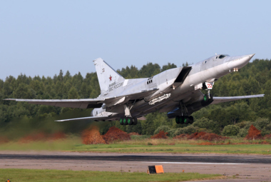 Russian military plane crashes and one of its crew members is killed