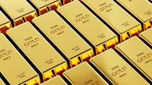 El oro está cerca de un mínimo de una semana a medida que sube el dólar