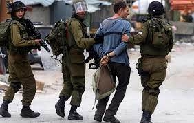 Zionist enemy forces arrest 14 Palestinians in West Bank, al-Quds 