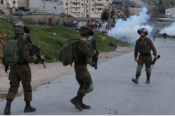 Two Palestinian children injured by enemy gunfire & beat citizen