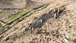 Los medios militares distribuyen imágenes de los restos del avión no tripulado MQ-9 de EE. UU. que fue derribado en la gobernación de Sana'a.