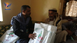 توزيع هدايا لأسر الشهداء بمديريات محافظة حجة